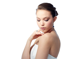 Image showing beautiful woman with earring, ring and pendant