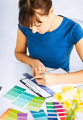 Image showing woman working with color samples for selection