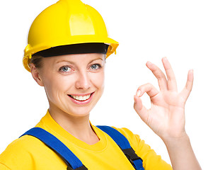 Image showing Young construction worker is showing OK sign