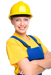 Image showing Young happy lady as a construction worker