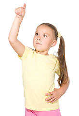 Image showing Little girl is pointing up