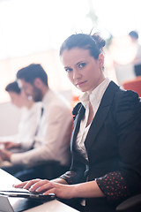 Image showing business woman on meeting  using tablet