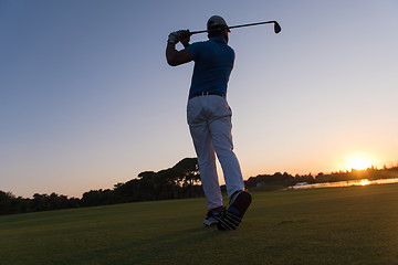 Image showing golfer hitting long shot