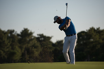 Image showing golfer hitting long shot