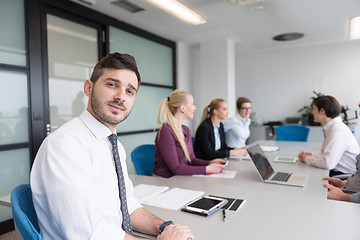 Image showing young business people group on team meeting at modern office