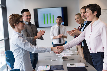 Image showing business womans handshake