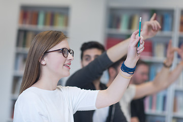 Image showing group of students  raise hands up