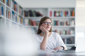 Image showing female student study in school library