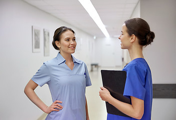 Image showing medics, nurses or doctors talking at hospital