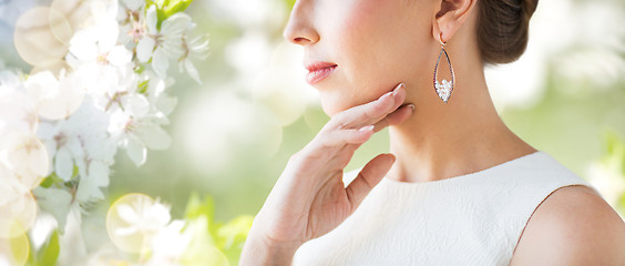 Image showing close up of beautiful woman face with earring