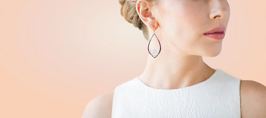 Image showing close up of beautiful woman face with earring