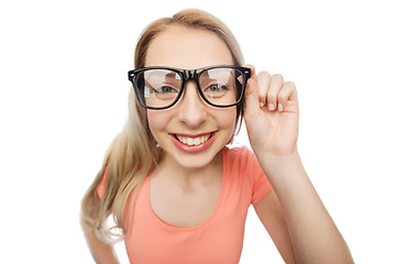 Image showing happy young woman or teenage girl in eyeglasses