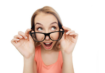 Image showing happy young woman or teenage girl in eyeglasses