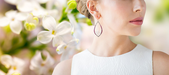 Image showing close up of beautiful woman face with earring