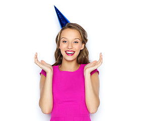 Image showing happy young woman or teen girl in party cap