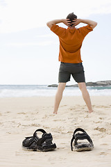 Image showing Man doing exercises on beach