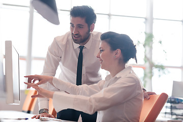 Image showing business couple working together on project