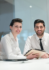 Image showing portrait of young  business couple at office