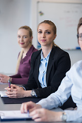 Image showing young business people group on team meeting at modern office