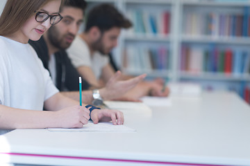 Image showing group of students study together in classroom