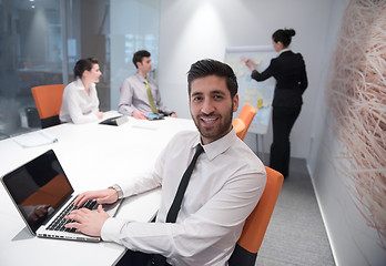 Image showing young business man at meeting