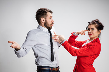 Image showing The business man and woman communicating on a gray background