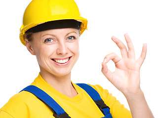 Image showing Young construction worker is showing OK sign