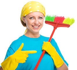 Image showing Young woman as a cleaning maid