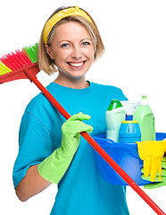 Image showing Young woman as a cleaning maid