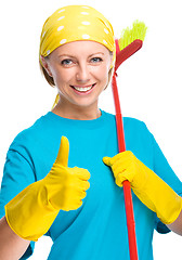 Image showing Young woman as a cleaning maid