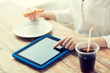 Image showing close up of woman with tablet pc counting calories