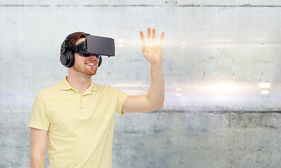 Image showing happy man in virtual reality headset or 3d glasses