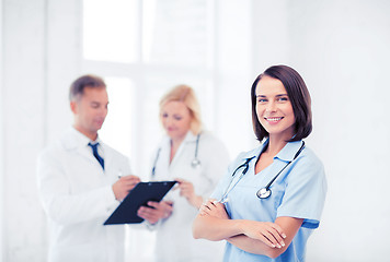 Image showing young female doctor with stethoscope