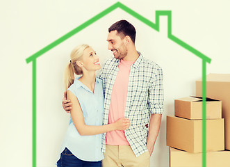 Image showing couple with cardboard boxes moving to new home