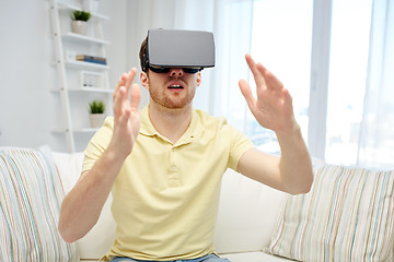 Image showing young man in virtual reality headset or 3d glasses