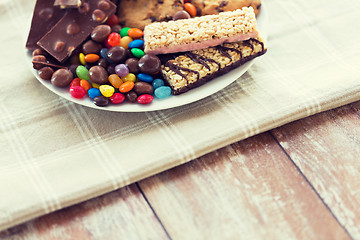 Image showing close up of candies, chocolate, muesli and cookies