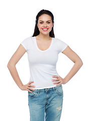 Image showing happy young woman or teenage girl in white t-shirt