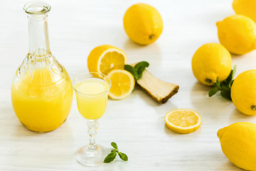 Image showing Italian traditional liqueur limoncello with lemon