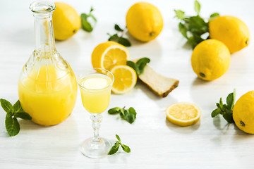 Image showing Italian traditional liqueur limoncello with lemon