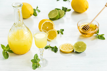 Image showing Italian traditional liqueur limoncello with lemon