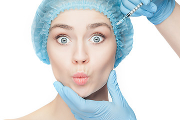 Image showing Attractive woman at plastic surgery with syringe in her face