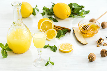 Image showing Italian traditional liqueur limoncello with lemon