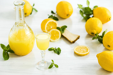 Image showing Italian traditional liqueur limoncello with lemon