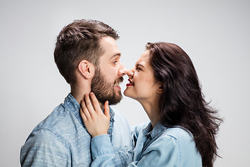 Image showing Portrait of happy couple on gray background