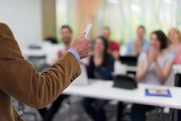 Image showing close up of teacher hand while teaching in classroom