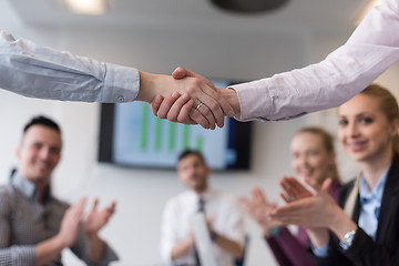 Image showing business womans handshake