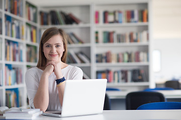 Image showing female student study in school library