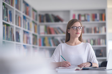 Image showing female student study in school library