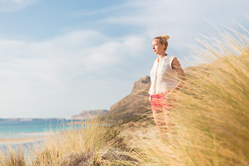 Image showing Relaxed Happy Woman Enjoying Sun on Vacations.