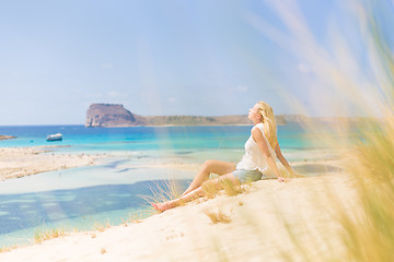 Image showing Relaxed Happy Woman Enjoying Sun on Vacations.